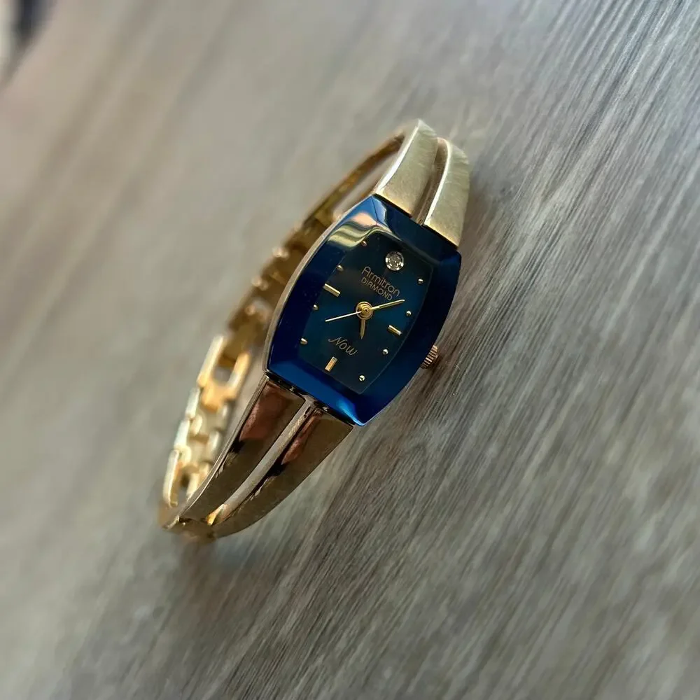 Armitron Diamond Now Blue Dial Gold Tone Bangle Watch